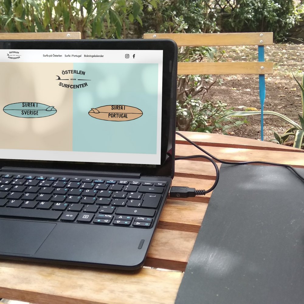 Hemsida för Österlen Surfcenter visad på en tablet och en mobil